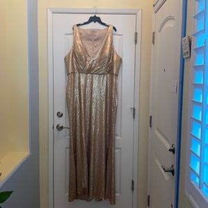 Gold sequin dress with a razor back hidden zipper new with tags on